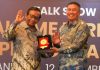 Caption foto: Mahfud MD saat menghadiri Anugerah Dewan Pers, Senin (12/12/2022).